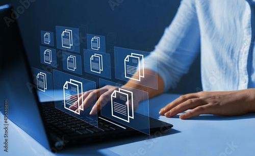 Online documentation database and document management system concept. Process automation to efficiently manage files. photo