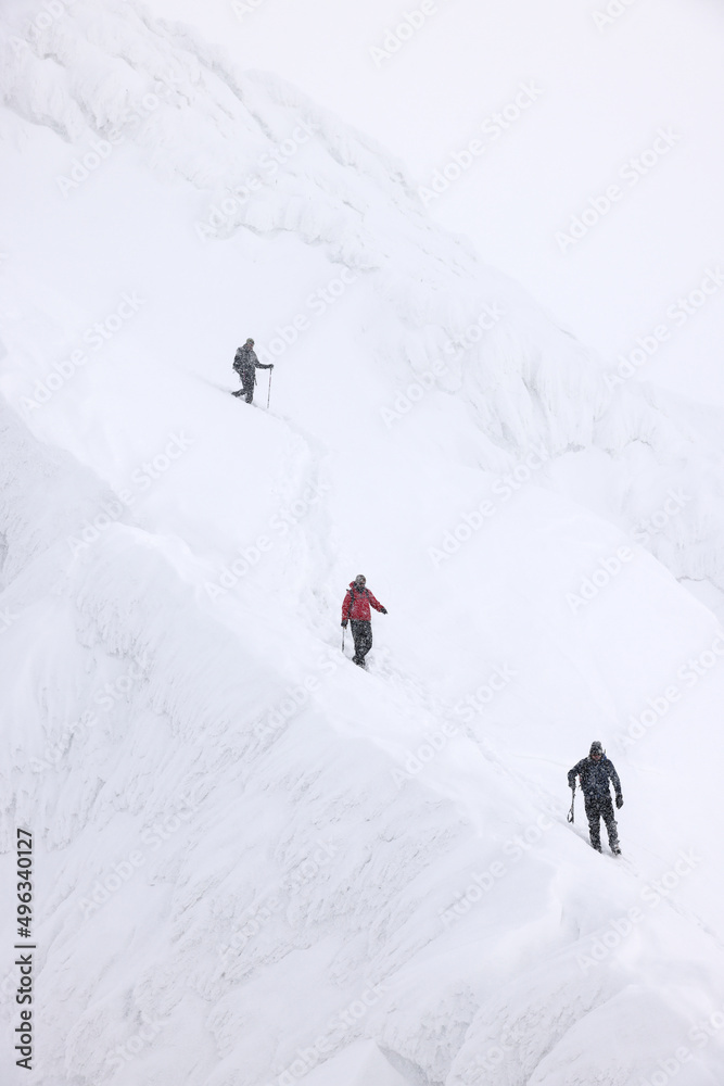 Mountaineers climbing with crampons in the Transylvanian Alps, Romania, Europe