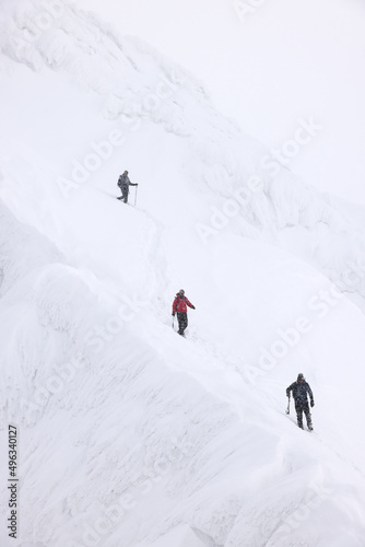 Mountaineers climbing with crampons in the Transylvanian Alps, Romania, Europe