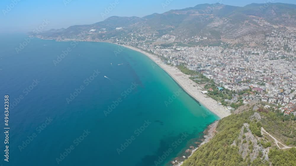 Alanya beach top view on the mountain with coast on blue sea and harbor city background. Beautiful cleopatra beach Alanya Turkey landscape travel landmark. Top view from drone
Alanya beach top view on the mountain with coast on blue sea and harbor city background. Beautiful cleopatra beach Alanya Turkey landscape travel landmark. Top view from drone