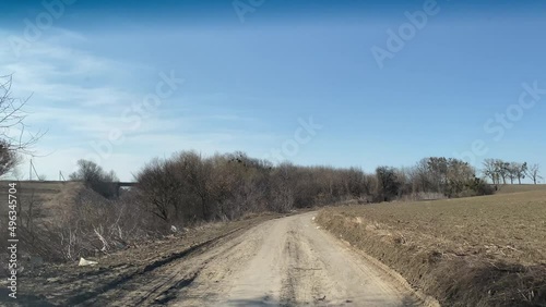 Ukraine. March 2022. Environmental disaster. Agricultural fields are polluted with waste photo