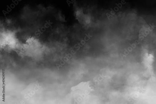 Smoke texture overlays on Isolated background. Smoke on floor. Isolated black background. Misty fog effect. magic fog, dust texture effect. White clouds, Gas explodes, swirl and dances in space. © AshanRandika