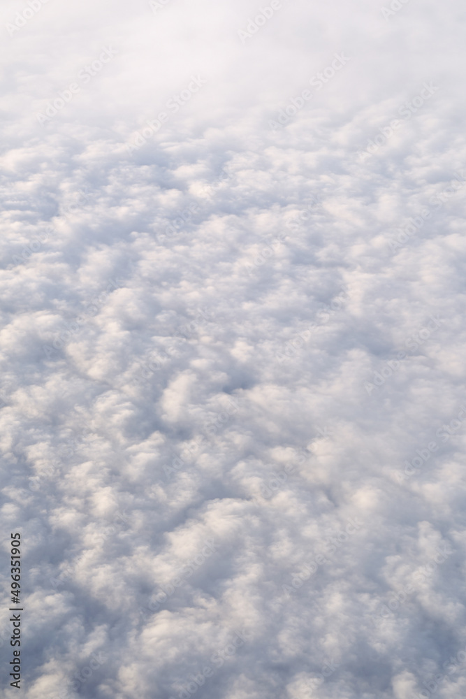 View of clouds from above. Heaven background. Clear cloudscape