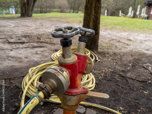 Watering hydrants in the park. Watering system.