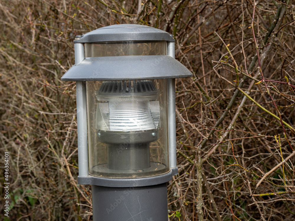 Lighting poles in the park. Lighting paths in the park. Lighting poles in the park. Lighting paths in the park.