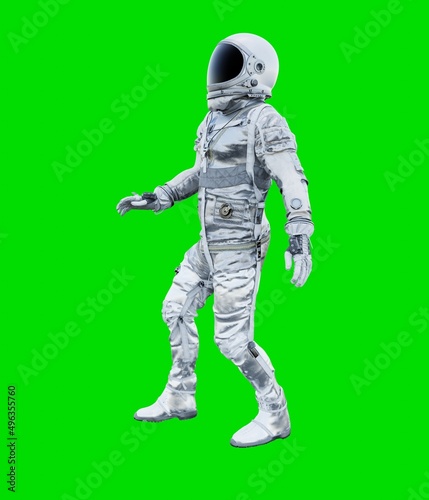 Astronaut isolated on green background © Charlie
