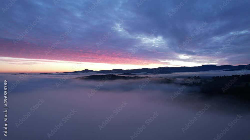 4k drone fog to sunset over clouds, mountains, and forest 4k drone fog to sunset over clouds, mountains, and forest