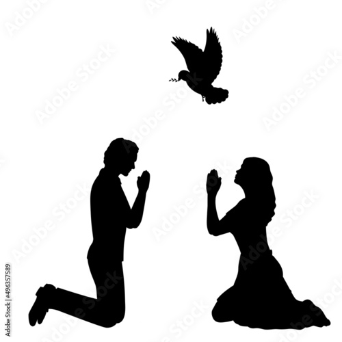 Silhouettes of man and woman pray for peace. I