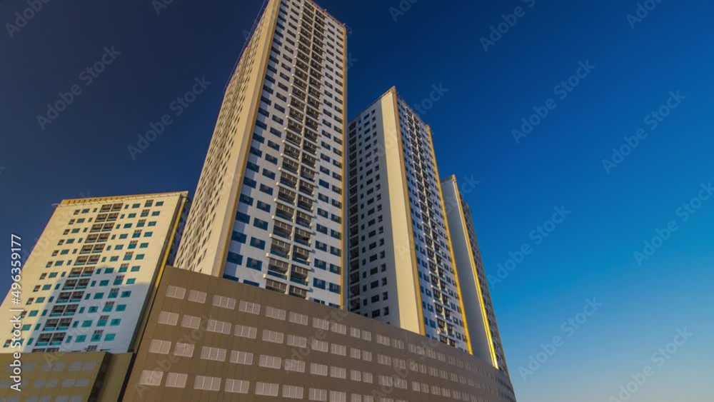 Modern new towers in Ajman timelapse hyperlapse. Cityscape of Ajman. Modern new towers in Ajman timelapse hyperlapse. Cityscape of Ajman.