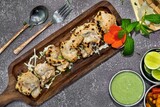 Chicken malai tikka is a popular chicken kebab & kabab made by using boneless chicken pieces in a creamy cashew-nuts based marination. Malai kabab is a creamy kebab with a distinct favour of cardamom
