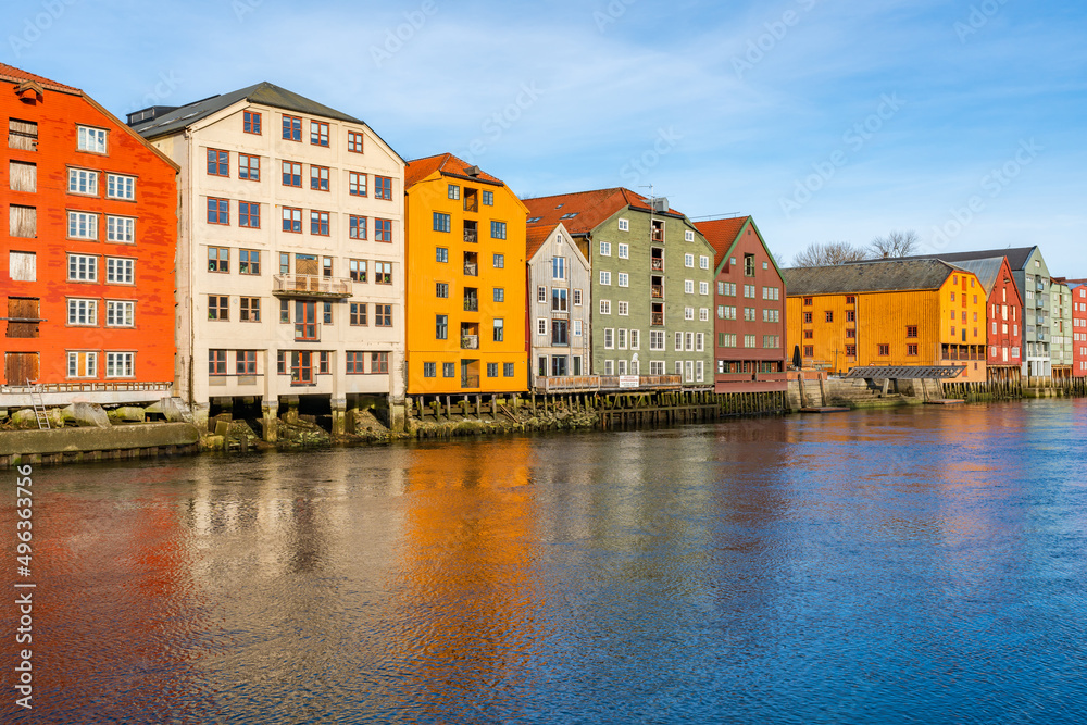 Colorful old wooden houses along river Nidelva in the Brygge district in Trondheim, Norway