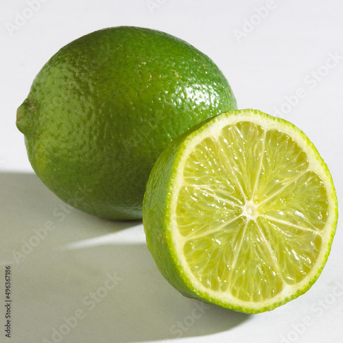 Close-up of two limes photo