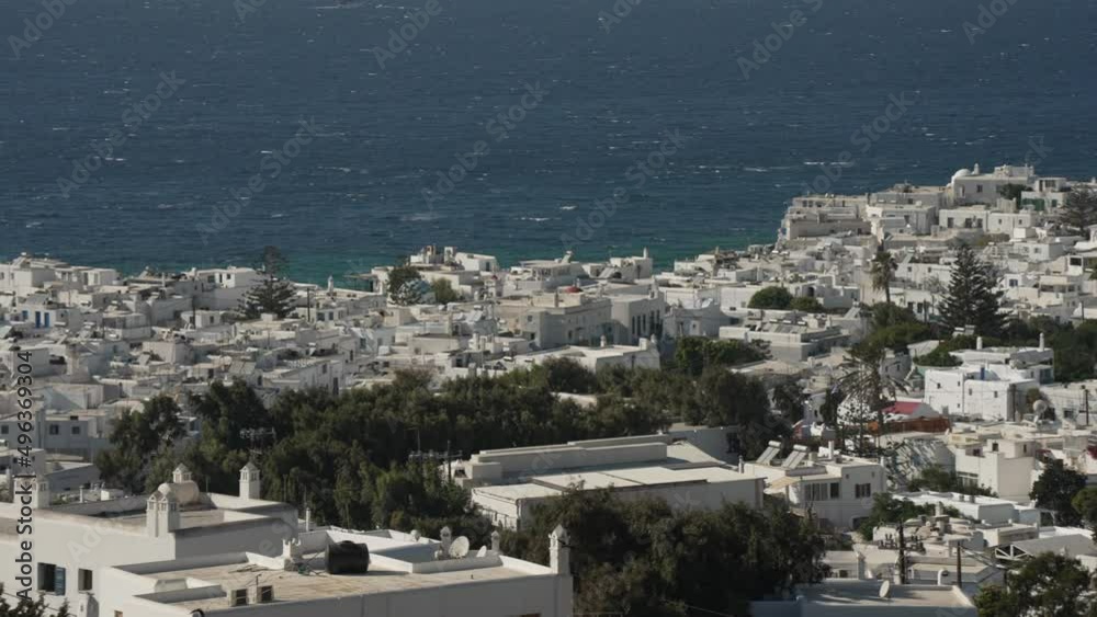 Town, windmills and Aegean Sea from elevated position, Mykonos Town, Mykonos, Cyclades, Greek Islands