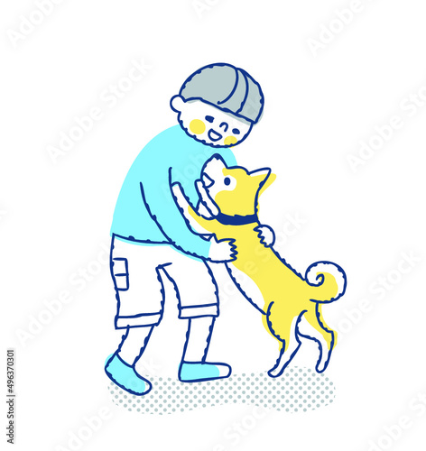 犬と戯れ合う男の子