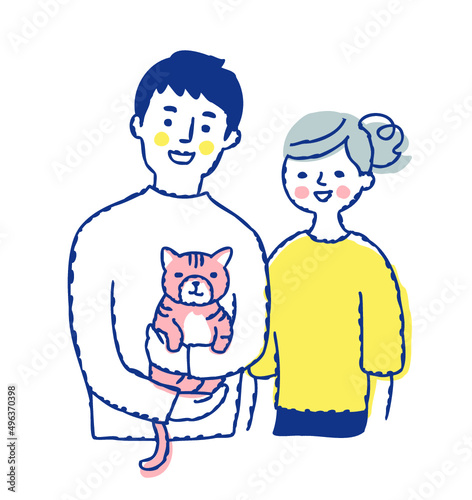 猫を抱っこしている笑顔の男性と女性