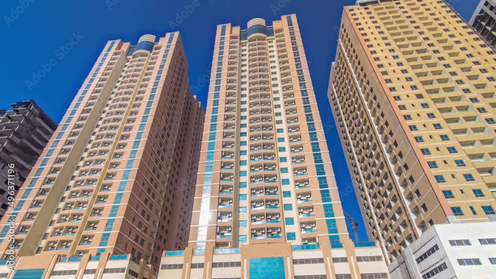 Modern new towers in Ajman timelapse hyperlapse. Cityscape of Ajman. Modern new towers in Ajman timelapse hyperlapse. Cityscape of Ajman.