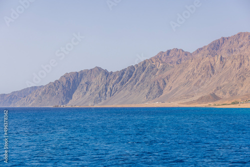 The Red Sea on the Gulf of Aqaba, surrounded by the mountains of the Sinai Peninsula, Dahab, Egypt