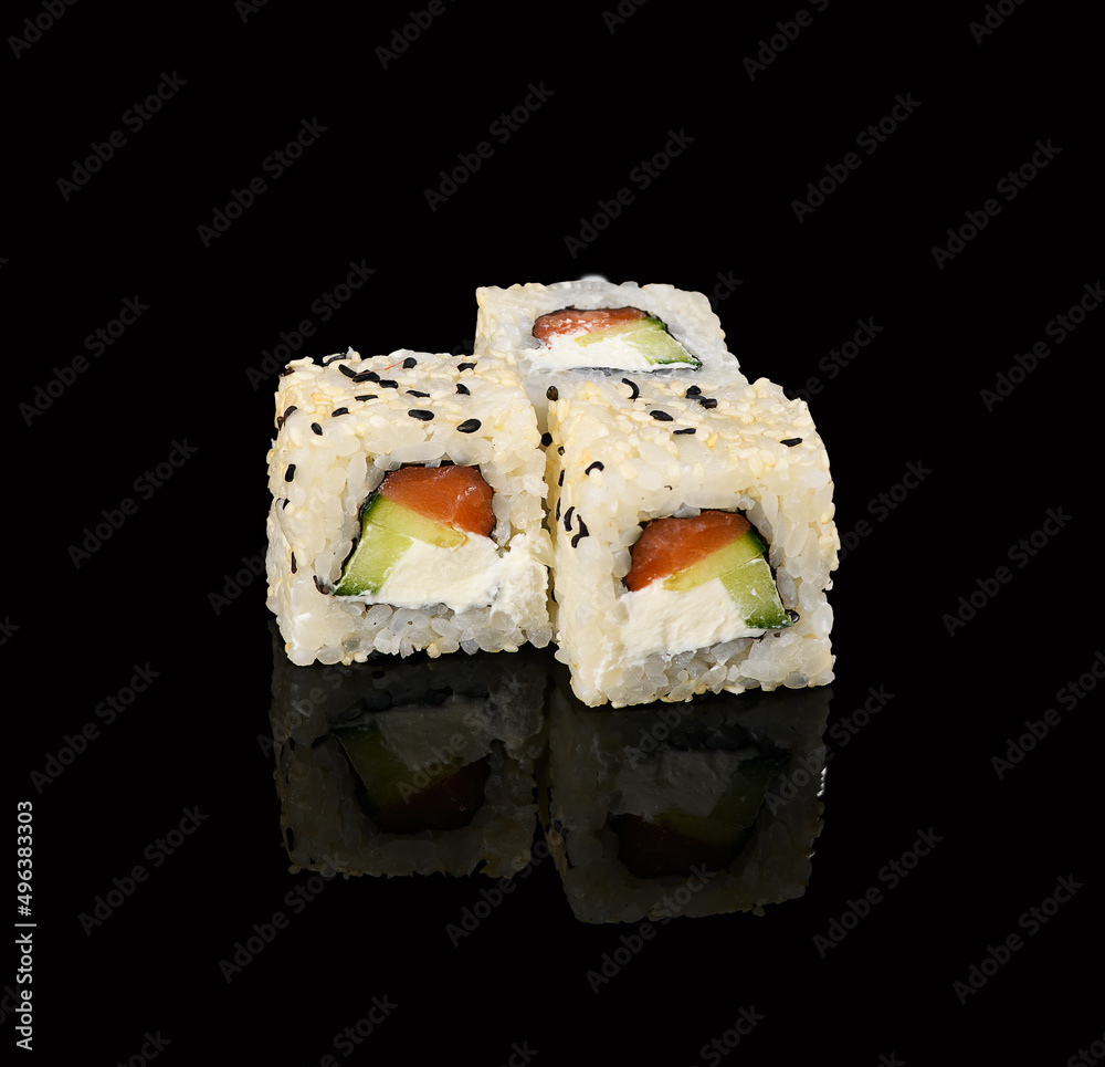 rolls on a black background with reflection rolls on a black background with reflection