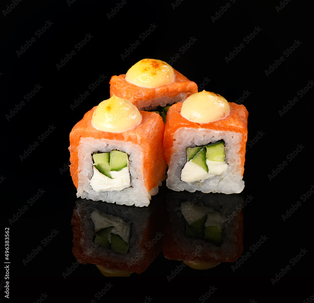 rolls on a black background with reflection rolls on a black background with reflection