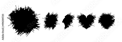Ink or stain of various sizes. A set of blots. 