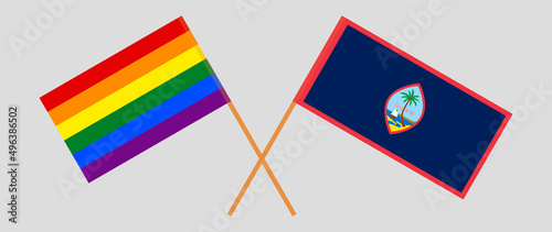 Crossed flags of LGBTQ and Guam. Official colors. Correct proportion