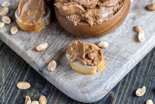 nut food on a cutting wooden board in the kitchen