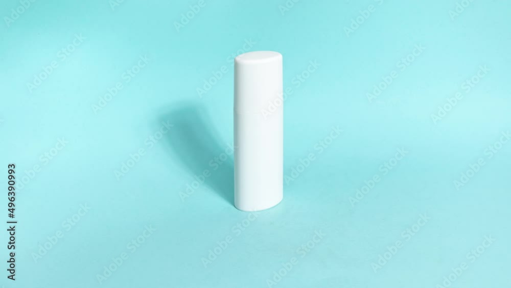 4k White tubes of skin care cosmetics alternately appear on a blue background and all line up. The concept of face and body skin care and anti-aging treatments. Copy space. Stop motion animation. 4k White tubes of skin care cosmetics alternately appear on a blue background and all line up. The concept of face and body skin care and anti-aging treatments. Copy space. Stop motion animation.