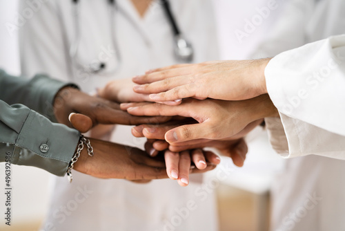 Medical Team Stacking Hands Against