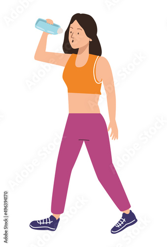 young sportswoman drinking water