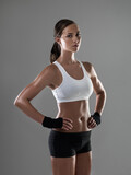 Feeling strong inside and out. Shot of an athletic woman in workout clothes standing with her hands on her hips.