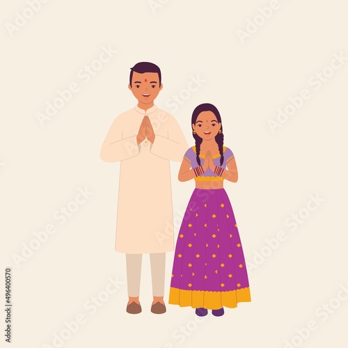 Happy Indian Children Dressed In Beautiful Traditional Clothes Greeting With “Namaste” Pose. Deepavali. Diwali.
