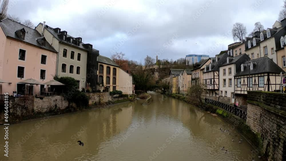 Luxembourg, December 4, 2021: The Grund district is one of Luxembourg City's oldest neighborhoods. Grund is the lower fortified area of Luxembourg city, located on the banks of the River Alzette. Luxembourg, December 4, 2021: The Grund district is one of Luxembourg City's oldest neighborhoods. Grund is the lower fortified area of Luxembourg city, located on the banks of the River Alzette.