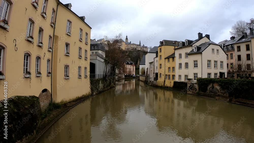 Luxembourg, December 4, 2021: The Grund district is one of Luxembourg City's oldest neighborhoods. Grund is the lower fortified area of Luxembourg city, located on the banks of the River Alzette. Luxembourg, December 4, 2021: The Grund district is one of Luxembourg City's oldest neighborhoods. Grund is the lower fortified area of Luxembourg city, located on the banks of the River Alzette.