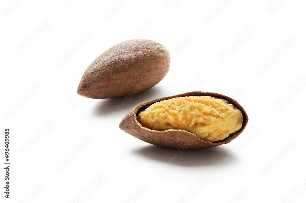 Dried red nuts with white background