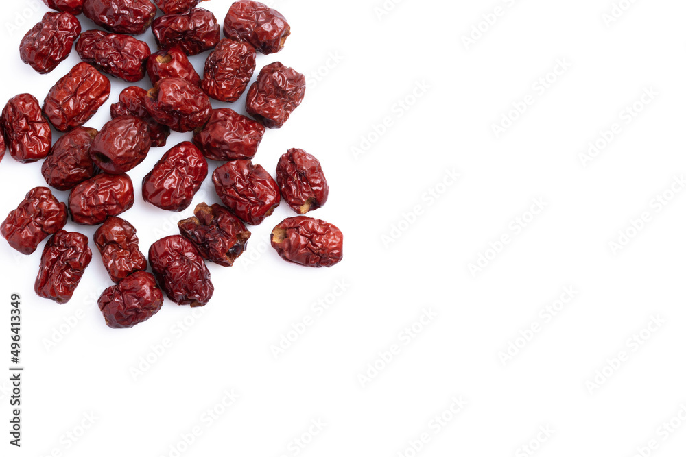 Dried Chinese jujube piled on a white background. Isolated image. Dried Chinese jujube piled on a white background. Isolated image.