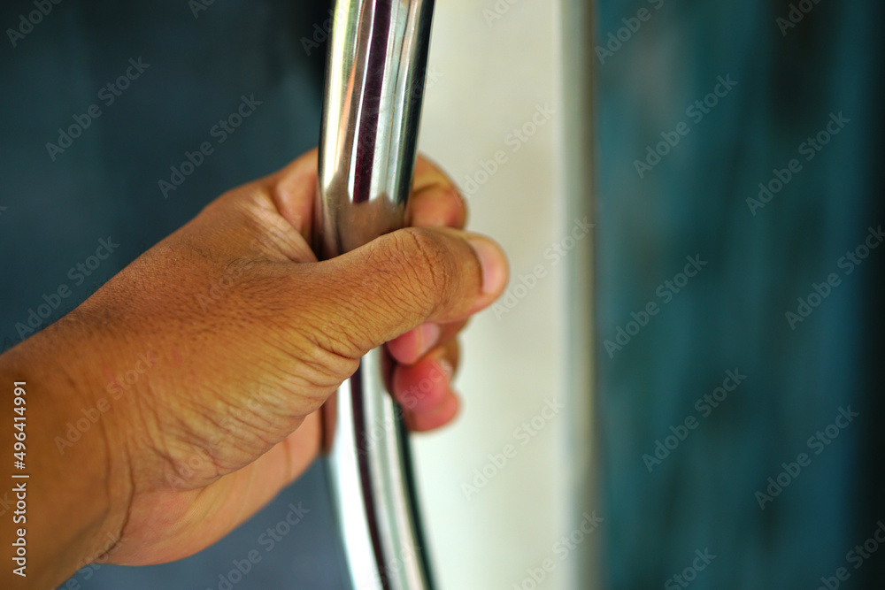 human hand opening the door