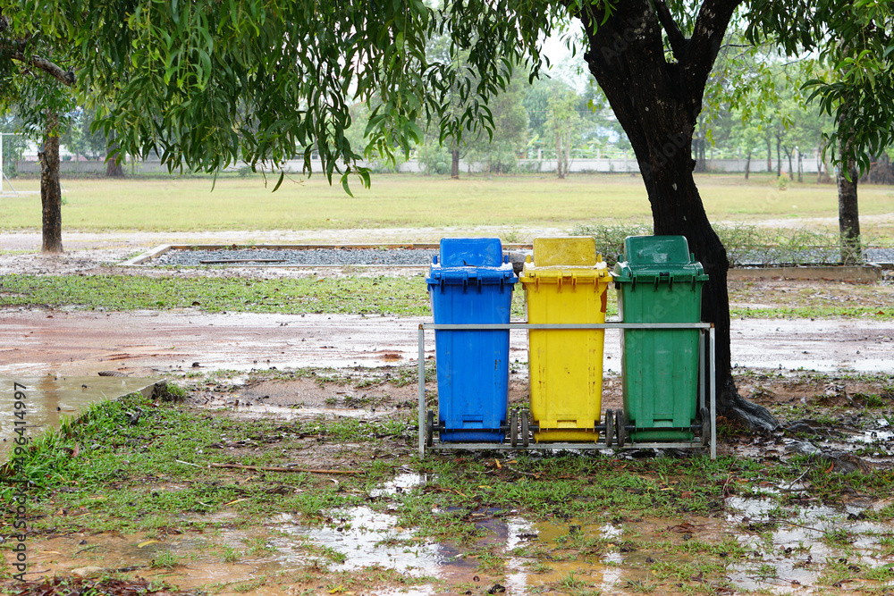 trash bin in the park on a rainy day