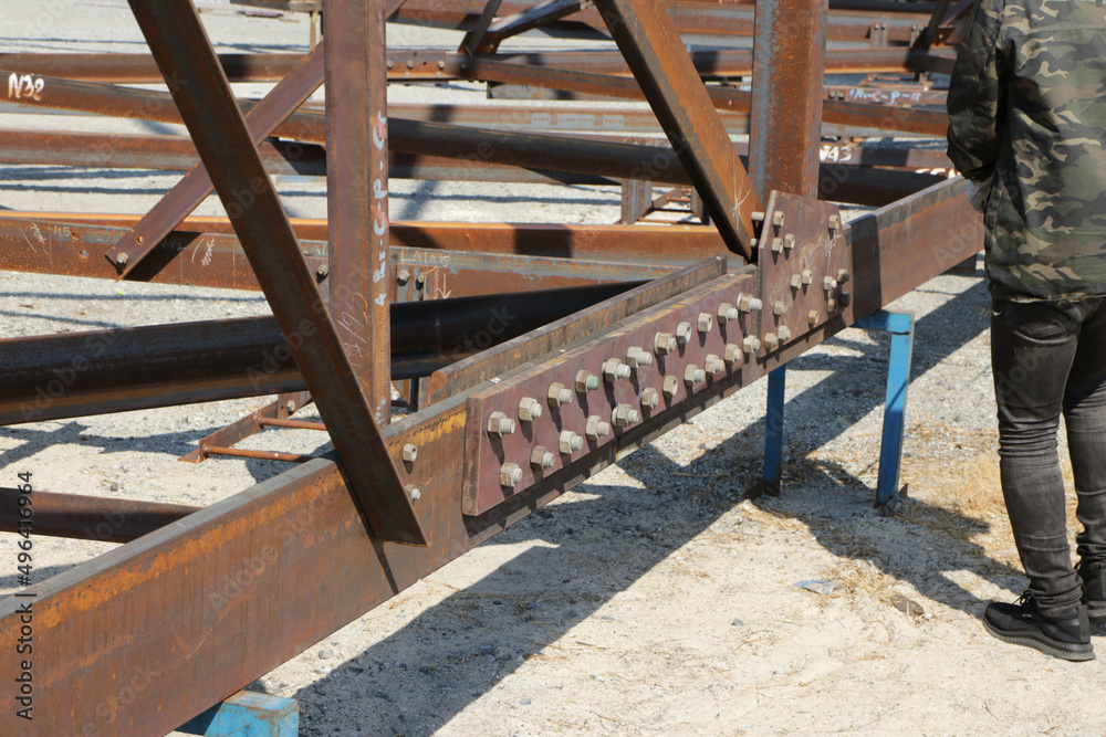 Assembly of steel tower with bolt and nut on site Assembly of steel tower with bolt and nut on site