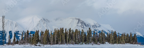 Stunning snow capped mountains panoramic scenic view in winter. 