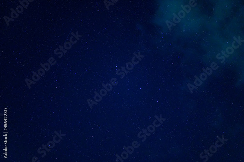Stars on night blue starry sky. Milky Way, galaxies and universes on a dark deep background