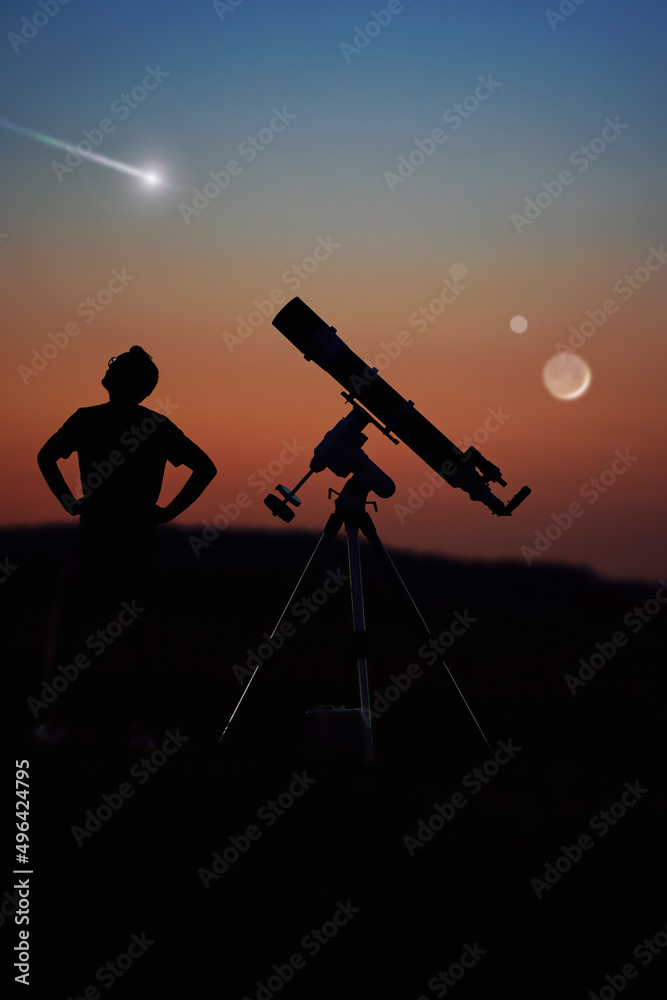 Silhouette of a man, telescope and countryside under the starry skies with young Moon.