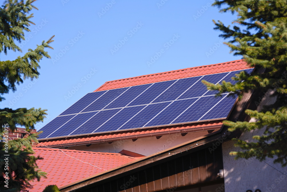 Photovoltaic panels on a red roof 