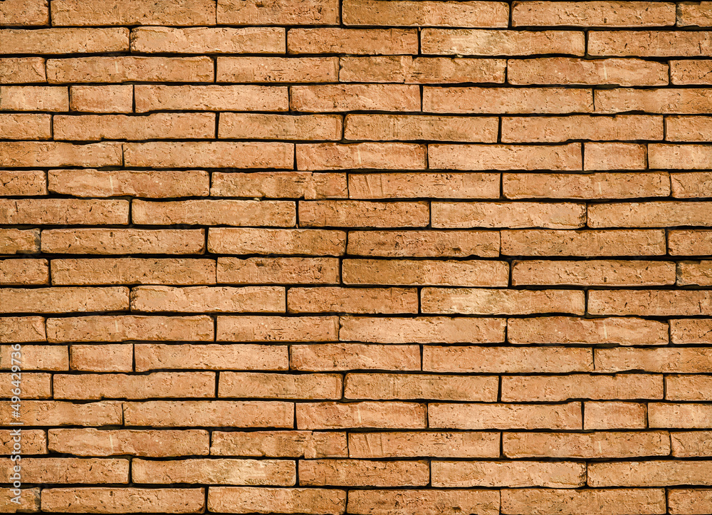 Fototapeta premium Vintage style red brown brick wall background.