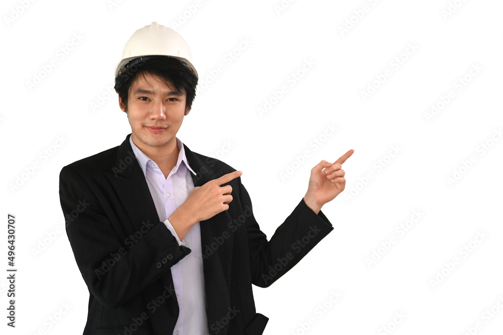 Young architect man wearing helmet and finger to the side isolated on white background. Young architect man wearing helmet and finger to the side isolated on white background.