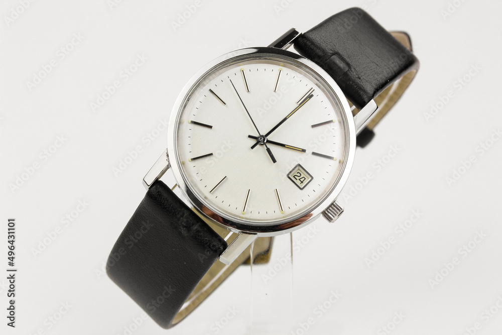 puristic antique silver watch swiss made used worn wristwatch isolated elegant noble retro classic luxurious front view close up Macro rare pocketwatch with black leather bracelet band strap modern puristic antique silver watch swiss made used worn wristwatch isolated elegant noble retro classic luxurious front view close up Macro rare pocketwatch with black leather bracelet band strap modern