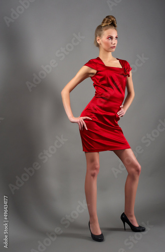 Sexy slim woman in red dress