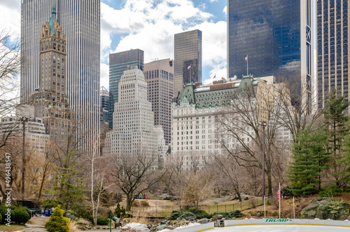 View of The Plaza Hotel in New York City during Winter with trumps Wollman Rink in the forefront, daytime, horizontal