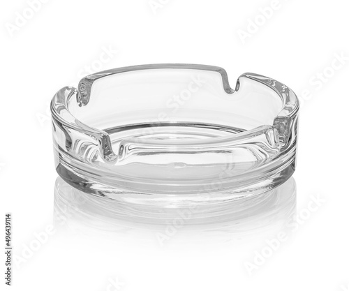 Transparent glass ashtray isolated on white background. Ware for bar, restaurant, pub, cafe.