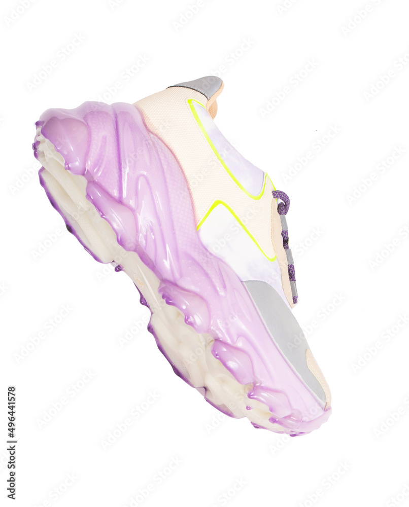 Flying Modern stylish sneakers isolated on a white background Flying Modern stylish sneakers isolated on a white background