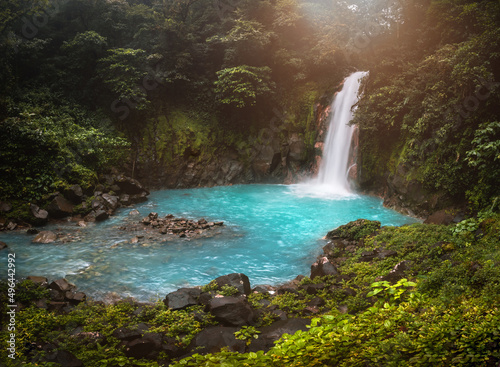 Waterfall and natural pool with turquoise water Rio Celeste, Costa Rica © Michail